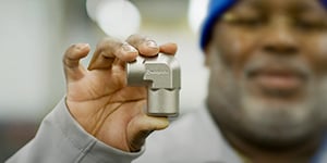 Swagelok associate holding a tube fitting