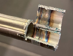 A weld bead demonstrating oxidation, seen via colorful striping