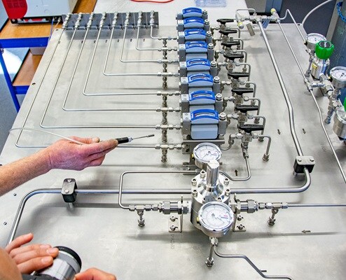 Emission control panel leak testing