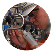 Engineer inspecting gas compression system